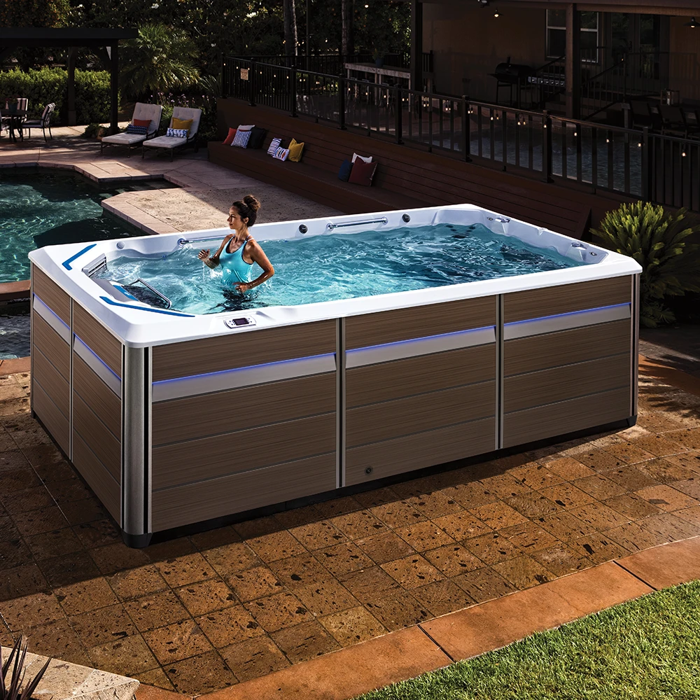 A women running on an underwater treadmill in an Endless Pools E550 Swim Spa